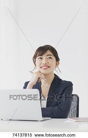 Stock Photography - Japanese businesswoman in the office. Fotosearch