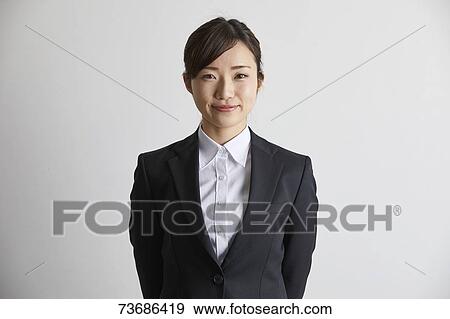 Japanese businesswoman on white background View Large Photo Image Stock Photo - Japanese businesswoman on white background. Fotosearch