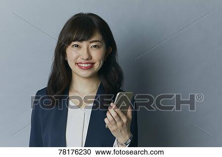 Stock Image - Japanese businesswoman. Fotosearch