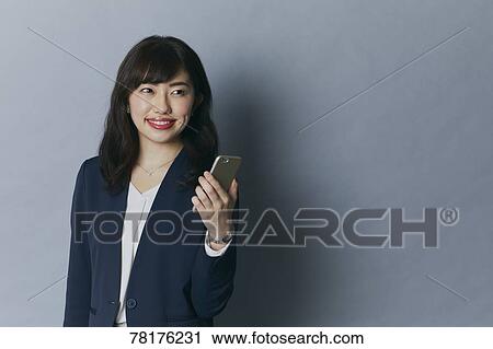 Stock Image - Japanese businesswoman. Fotosearch