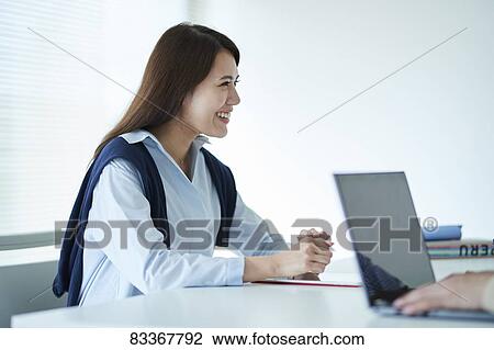 Stock Image - Japanese businesswoman. Fotosearch
