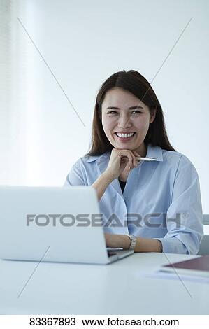 Stock Image - Japanese businesswoman. Fotosearch