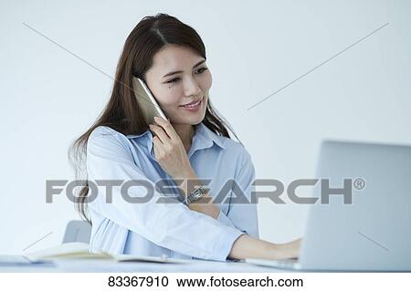 Stock Image - Japanese businesswoman. Fotosearch