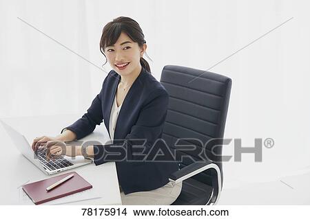 Japanese businesswoman working View Large Photo Image Picture - Japanese businesswoman working. Fotosearch