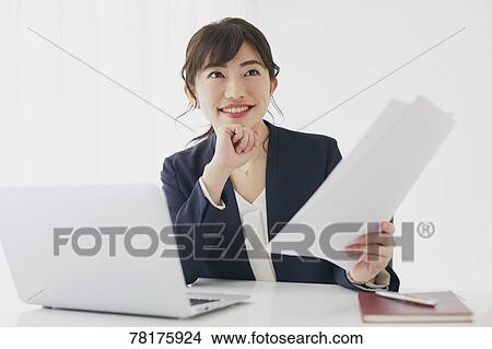 Japanese businesswoman working View Large Photo Image Picture - Japanese businesswoman working. Fotosearch