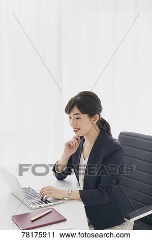 Japanese businesswoman working View Large Photo Image Stock Image - Japanese businesswoman working. Fotosearch