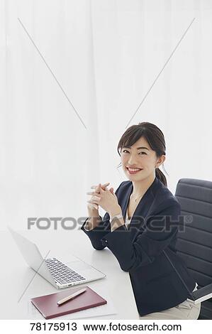 Japanese businesswoman working View Large Photo Image Stock Image - Japanese businesswoman working. Fotosearch