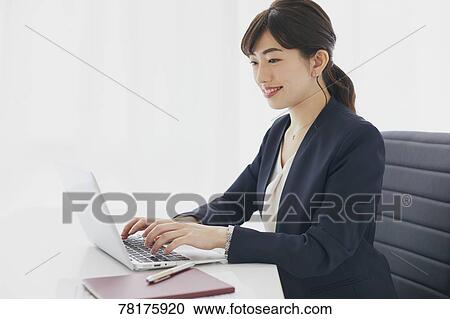 Japanese businesswoman working View Large Photo Image Stock Image - Japanese businesswoman working. Fotosearch