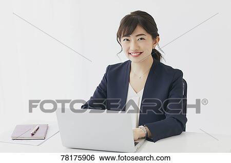 Japanese businesswoman working View Large Photo Image Stock Photograph - Japanese businesswoman working. Fotosearch
