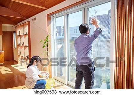 Japanese couple doing housework View Large Photo Image Stock Image - Japanese couple doing housework. Fotosearch