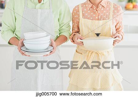 Japanese couple doing housework View Large Photo Image Stock Image - Japanese couple doing housework. Fotosearch