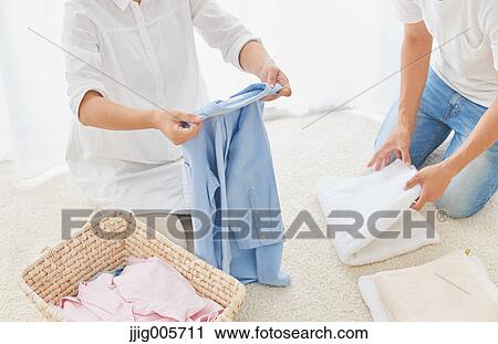 Japanese couple doing housework View Large Photo Image Stock Image - Japanese couple doing housework. Fotosearch