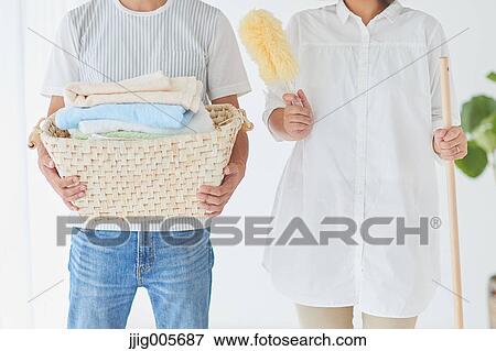 Japanese couple doing housework View Large Photo Image Stock Photo - Japanese couple doing housework. Fotosearch