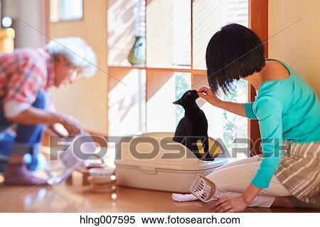 Japanese couple doing housework View Large Photo Image Stock Photography - Japanese couple doing housework. Fotosearch