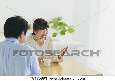 Japanese couple in the kitchen View Large Photo Image Stock Image - Japanese couple in the kitchen. Fotosearch