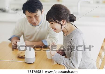 Japanese couple in the kitchen View Large Photo Image Stock Image - Japanese couple in the kitchen. Fotosearch