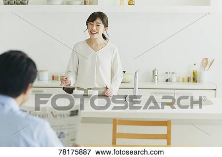 Japanese couple in the kitchen View Large Photo Image Stock Photo - Japanese couple in the kitchen. Fotosearch