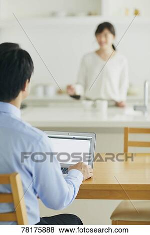 Japanese couple in the kitchen View Large Photo Image Stock Photo - Japanese couple in the kitchen. Fotosearch