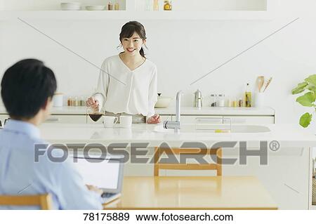 Japanese couple in the kitchen View Large Photo Image Stock Photo - Japanese couple in the kitchen. Fotosearch