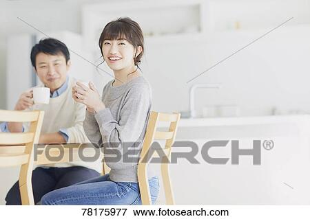 Japanese couple in the kitchen View Large Photo Image Stock Photo - Japanese couple in the kitchen. Fotosearch