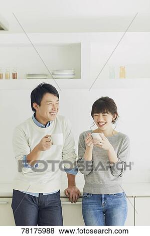 Japanese couple in the kitchen View Large Photo Image Stock Photo - Japanese couple in the kitchen. Fotosearch