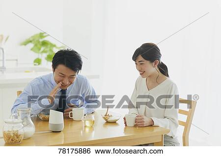 Japanese couple in the kitchen View Large Photo Image Stock Photograph - Japanese couple in the kitchen. Fotosearch