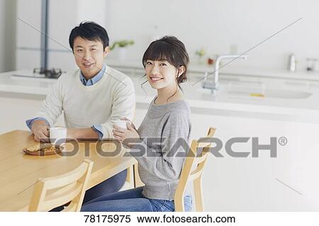 Japanese couple in the kitchen View Large Photo Image Stock Photography - Japanese couple in the kitchen. Fotosearch