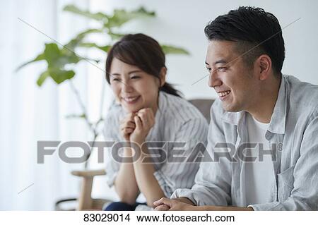 Japanese couple in the living room View Large Photo Image Picture - Japanese couple in the living room. Fotosearch