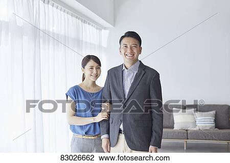 Japanese couple in the living room View Large Photo Image Stock Image - Japanese couple in the living room. Fotosearch