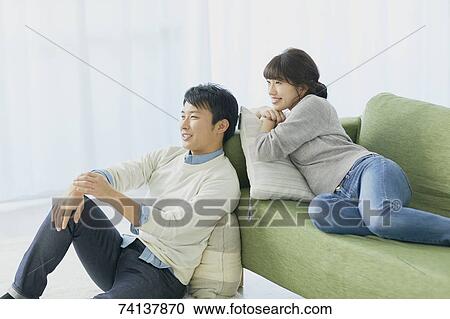 Japanese couple on the sofa View Large Photo Image Stock Image - Japanese couple on the sofa. Fotosearch