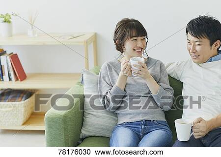 Japanese couple on the sofa View Large Photo Image Stock Image - Japanese couple on the sofa. Fotosearch