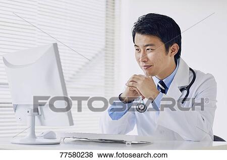 Japanese doctor in his studio View Large Photo Image Stock Photo - Japanese doctor in his studio. Fotosearch