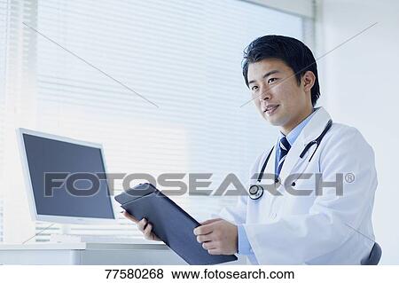 Japanese doctor in his studio View Large Photo Image Stock Photo - Japanese doctor in his studio. Fotosearch
