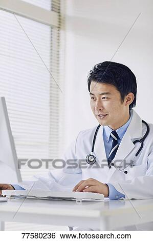 Stock Photograph - Japanese doctor in his studio. Fotosearch