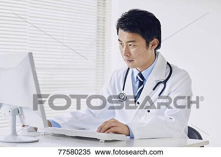 Japanese doctor in his studio View Large Photo Image Stock Photography - Japanese doctor in his studio. Fotosearch