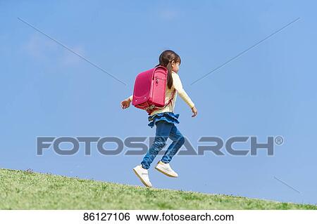 Stock Photograph - Japanese elementary schoolgirl. Fotosearch
