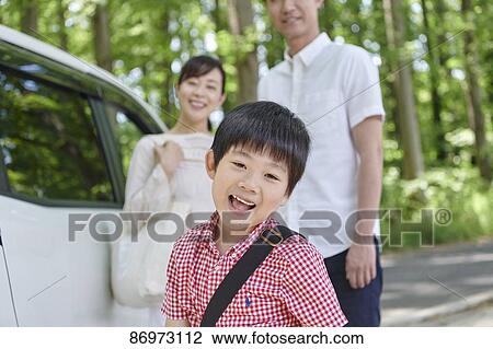 Japanese family in a city park View Large Photo Image Stock Image - Japanese family in a city park. Fotosearch