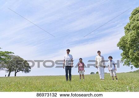 Japanese family in a city park View Large Photo Image Stock Image - Japanese family in a city park. Fotosearch