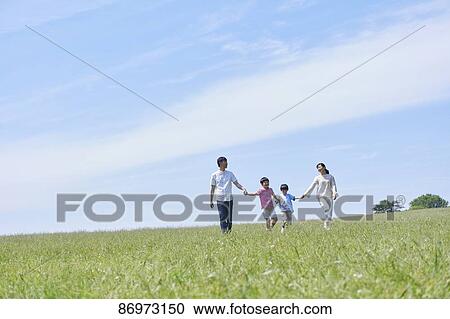 Japanese family in a city park View Large Photo Image Stock Image - Japanese family in a city park. Fotosearch