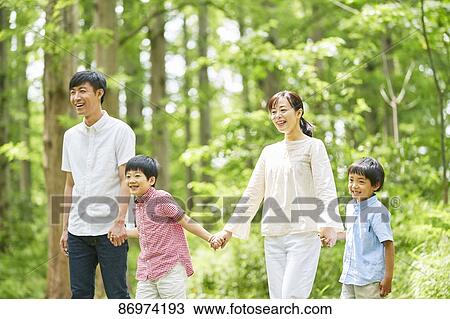 Japanese family in a city park View Large Photo Image Stock Image - Japanese family in a city park. Fotosearch