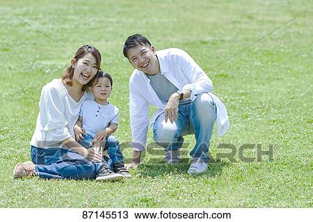 Japanese family in a city park View Large Photo Image Stock Image - Japanese family in a city park. Fotosearch