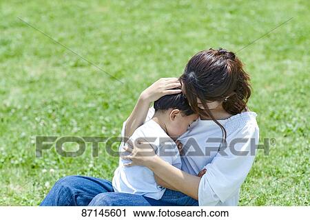 Japanese family in a city park View Large Photo Image Stock Image - Japanese family in a city park. Fotosearch