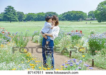 Japanese family in a city park View Large Photo Image Stock Image - Japanese family in a city park. Fotosearch