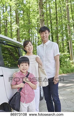 Japanese family in a city park View Large Photo Image Stock Photo - Japanese family in a city park. Fotosearch