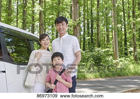 Japanese family in a city park View Large Photo Image Stock Photo - Japanese family in a city park. Fotosearch