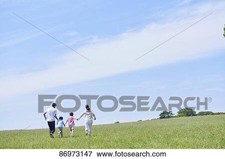 Japanese family in a city park View Large Photo Image Stock Photo - Japanese family in a city park. Fotosearch