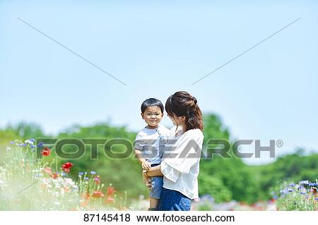 Japanese family in a city park View Large Photo Image Stock Photo - Japanese family in a city park. Fotosearch