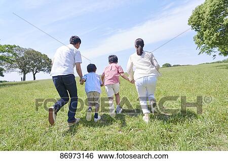 Japanese family in a city park View Large Photo Image Stock Photograph - Japanese family in a city park. Fotosearch