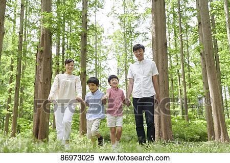 Japanese family in a city park View Large Photo Image Stock Photography - Japanese family in a city park. Fotosearch