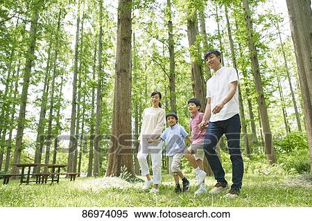 Japanese family in a city park View Large Photo Image Stock Photography - Japanese family in a city park. Fotosearch